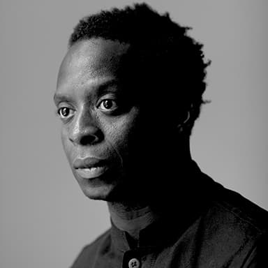 Headshot of Kobna Holbrook-Smith